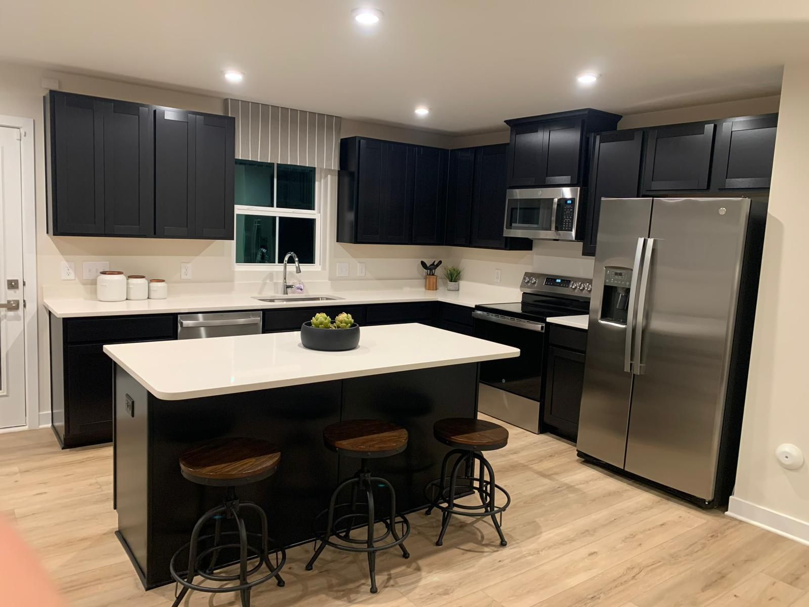 Modern kitchen with island and stools